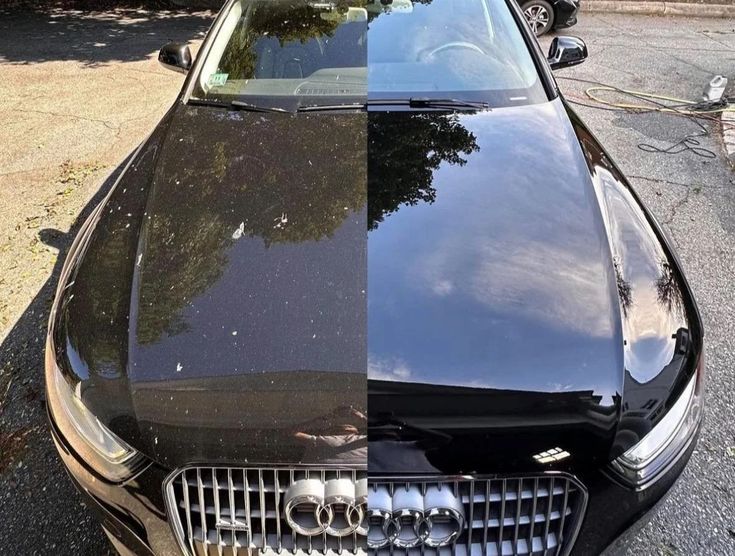 Audi hood before and after polish with clear reflection